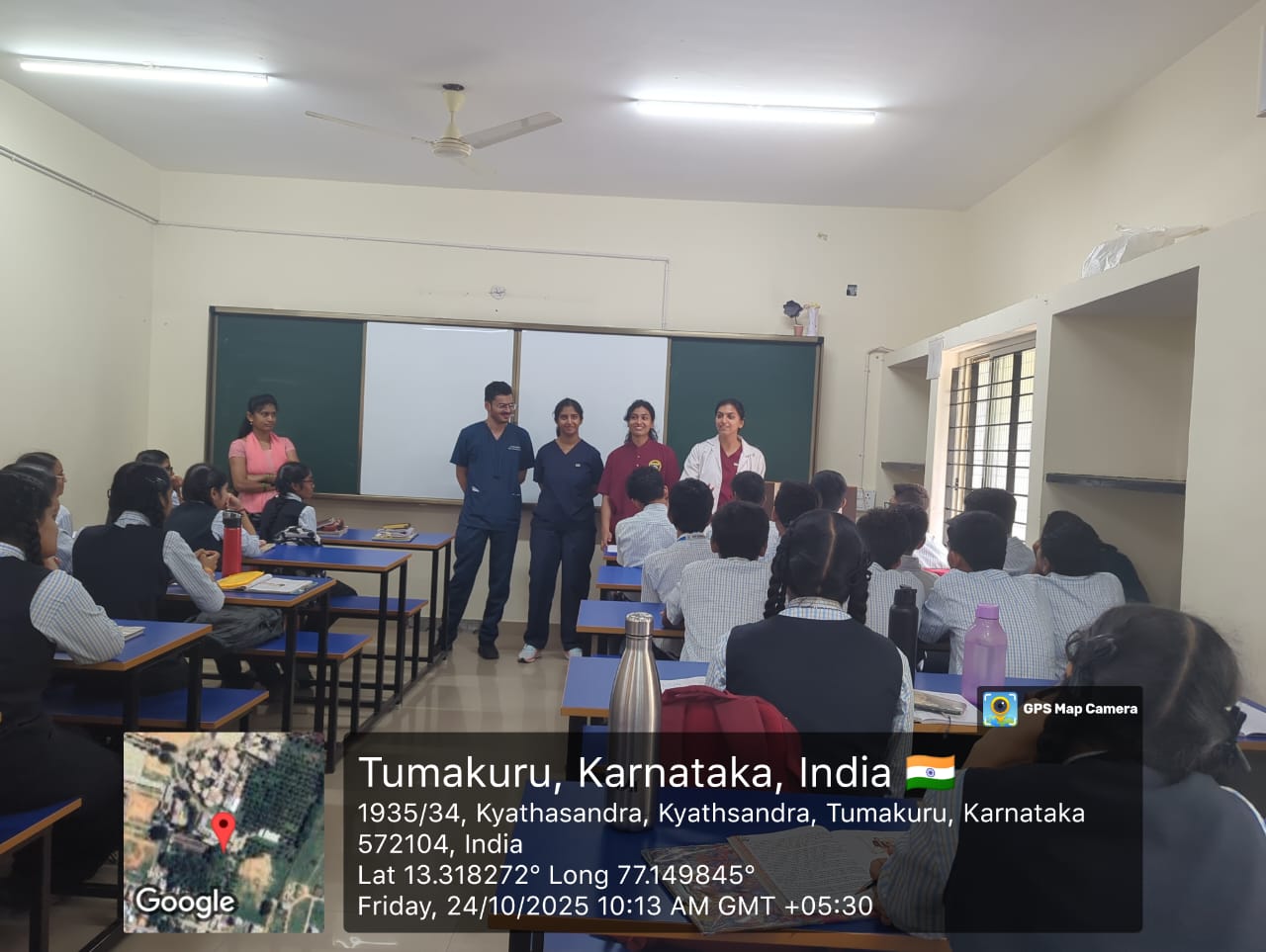 Dental team conducting health education session in a classroom on Day 1